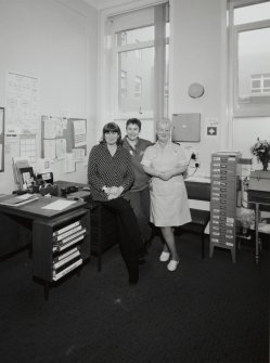 Interior. View of ground floor office with staff
