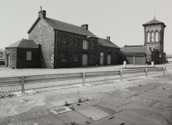 View of Hydraulic Power Station and dockside buildings from North East.