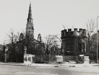 General view from West South West of watchtower in St Cuthbert's Churchyard.