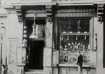 Edinburgh, 8 Melbourne Place.
General view of shop front 'A Mackie, Tool & Cutlery Warehouse' from East.

