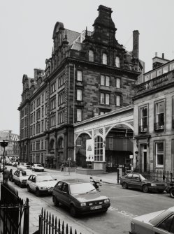 View from south west showing north west end of Rutland Street frontage including iron archway - former entrance to Princes Street Station