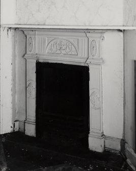 Interior of caretaker's flat at Lothian Road Church: detail of cast iron fireplace 

