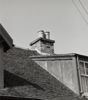 Detail of typical slate roof, chimney stack and fireclay cans