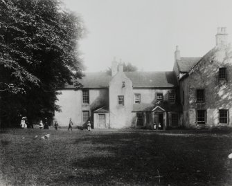 Edinburgh, Newtoft Street, Gilmerton House.
View of house from the garden, with figures.
