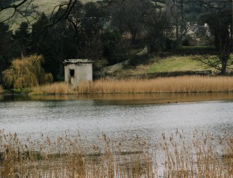 Distant view from S with loch