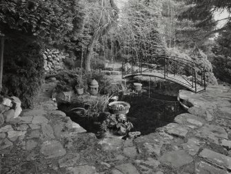 View of pond and bridge