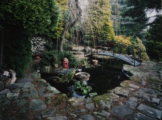 View of pond and bridge