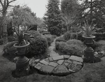 View of urns flanking steps