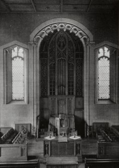 View of organ screen, pulpit and communion table designed by John McKay.