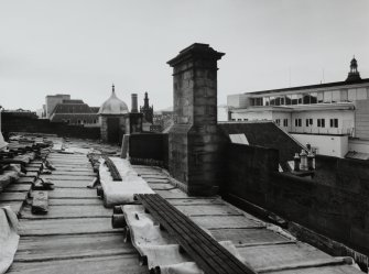 View of West parapet from North (including original chimney stack and Southwest bartizan