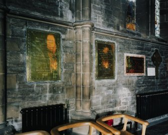 Interior.
View of wall mounted brass memorial plaques, including those of Alexander Cuningham W.S., Secretary to the Commissioners of Northern Lighthouses, and his wife Caroline.