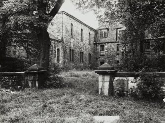 View of the Quaker Burial Ground at the rear of the Pleasance Church and the adjoining Mission Hall seen from the North East.