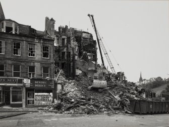 View from north west after blaze and during demolition.