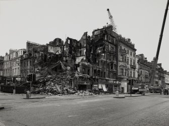 View from south west after blaze and during demolition.