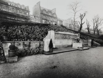 General view of memorial from south west, also showing part of Princes Street behind.