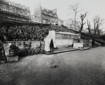 General view of war memorial from west, also showing part of Princes Street.
