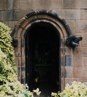 View of doorway to floral clock mechanism in plinth of statue to Alan Ramsay