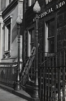 11 Queen Street, detail of lamp standards with flame glass tops, and railings