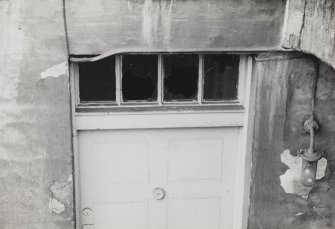 Detail of basement door, 30 Queen Street, D-type fanlight (as in frame 15, 17 Thistle Street) adapted to a basement doorway