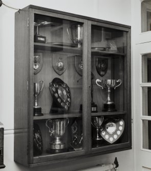 Station headquarters, hall, detail of trophy cabinet.