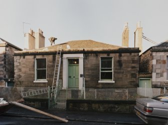 View from East South East showing street frontage, garden walls and gates