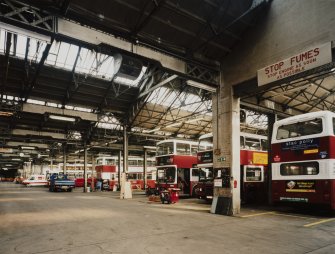 Edinburgh, Leith Walk, Shrub place, Shrubhill Tramway Workshops and Power Station
Interior view  from south within Body Shop, showing central aisle (left) down which a traverser moved, insterting trams into the bays (right).  Since the disappearance of trams in the 1960s, the depot has been occupied by buses, and the traverser and tram rails have been removed.