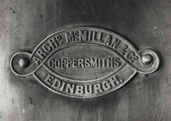Edinburgh, Slateford Road, Caledonian Brewery, interior.
View of name plate. 
Insc: 'Archd. McMillan & Co. Coppersmiths, Edinburgh'.