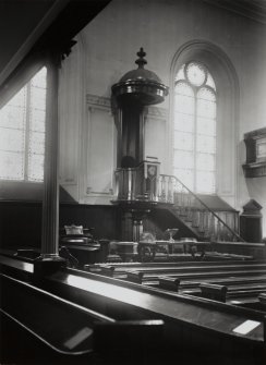 Interior showing pulpit and former windows.