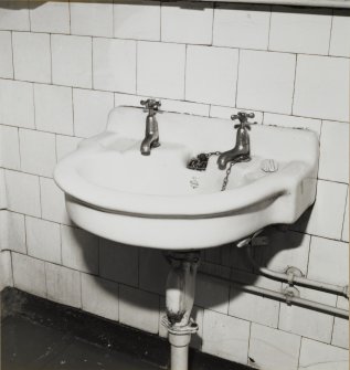 Interior-detail of wash hand basin in gents W.C. in Basement