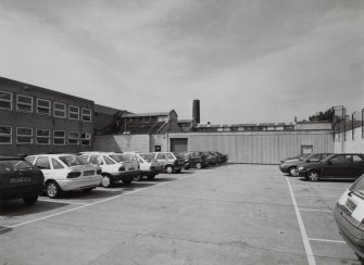 Edinburgh, Leith Walk, Shrub place, Shrubhill Tramway Workshops and Power Station
Exterior view from east showing Lothian Region Transport's offices (left), and the south east end of the workshops (centre)