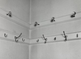 Interior. Lobby, detail of hat and coat hooks