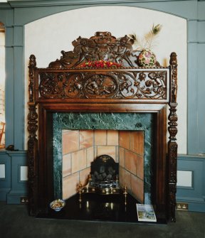 Interior, main South room, detail of fireplace on East wall.