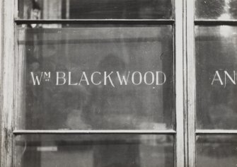 View of lettering on window screen (Wm Blackwood).