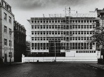 Exterior view of building under construction.