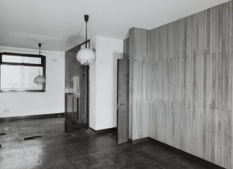 Top floor, caretaker's flat, view of living room cum kitchen