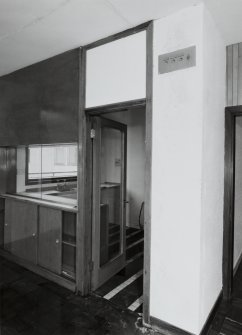 Top floor, caretaker's flat, view of living room cum kitchen