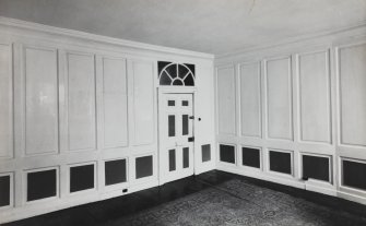 Interior.
View of third floor, north and west walls of east room.