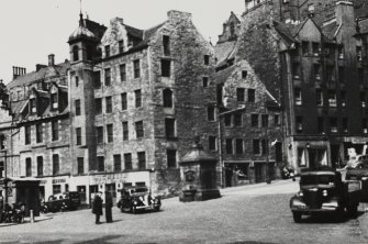 General view from SE of Nos 96-110 Grassmarket, and police box, Nos 95-107 West Bow, and Bow Foot Well.
