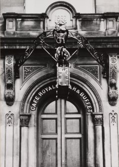 Detail showing insignia on frontage.