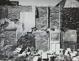 Edinburgh, Wester Close.
View of remains of external forestair and pair of blocked doorways at first floor level.