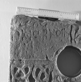 Inscribed pictish symbol stone. Detail of inscription with scale.