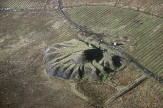 Oblique aerial view of Lochend Colliery pit no.5, taken form the ESE. The bing from the pit overlies rig cultivation.