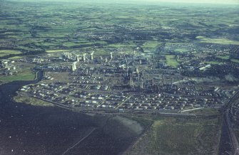Oblique aerial view centred on the oil refinery, taken from the NE.