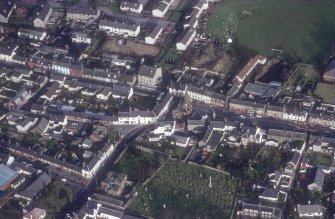 Oblique aerial view centred on burial ground from S.