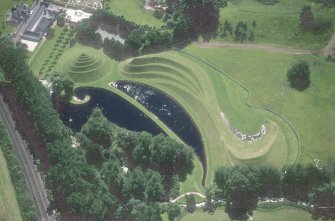 Oblique aerial view centred on the garden, taken from the N.