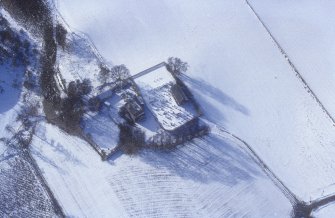 Kirkton of Glenbuchat, oblique aerial view, taken from the E, centred on the Old Parish Church, manse, and burial ground.