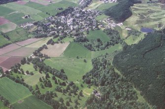 Castle Leod.
Oblique aerial view, taken from the NE, centred on the tower-house and a possible golf course. Strathpeffer is visible in the top half of the photograph.