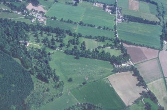 Castle Leod.
Oblique aerial view, taken from the SW, showing the tower-house, a possible golf course and the gate lodge.