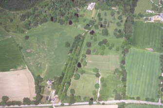 Castle Leod.
Oblique aerial view, taken from the SE, showing the tower-house, a possible golf course and the gate lodge.