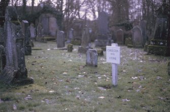 View of cholera stone in graveyard